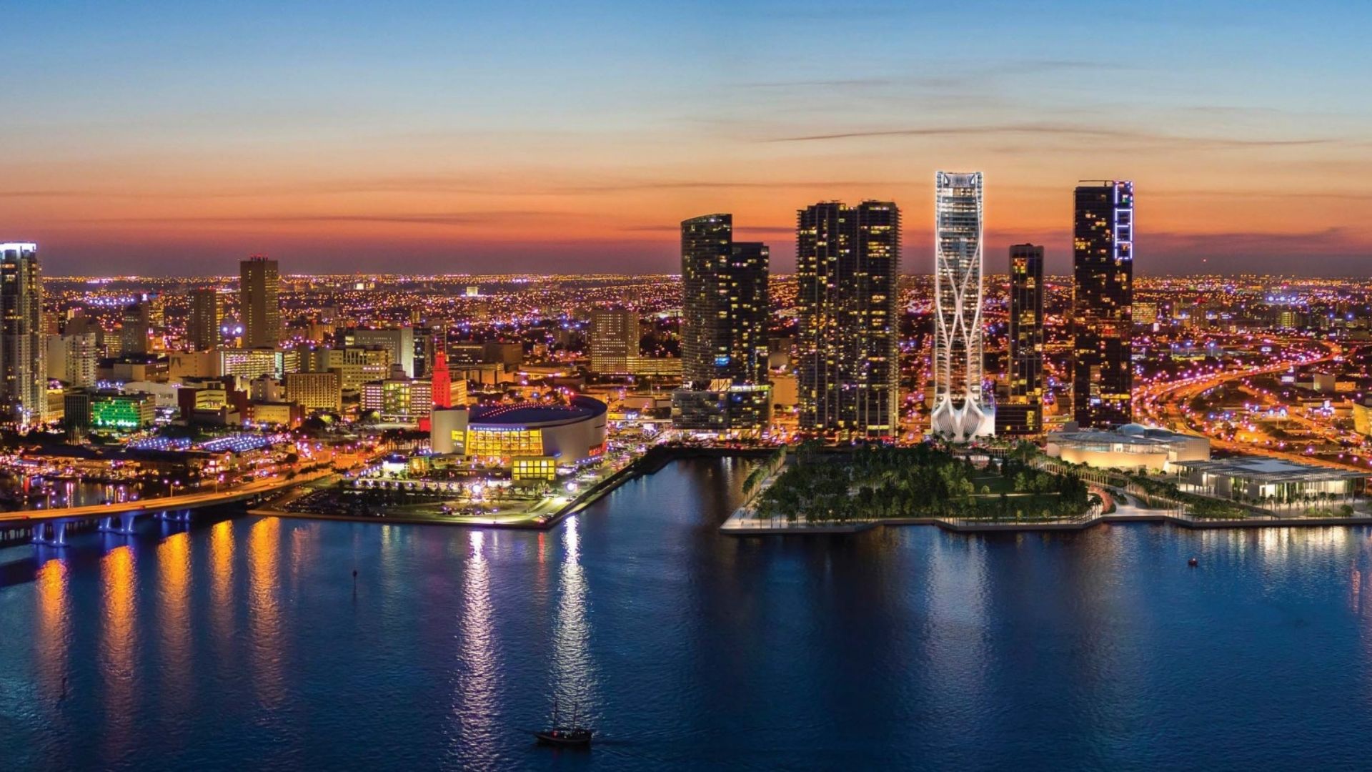 Rendering of One Thousand Museum building at night from Biscayne Bay.